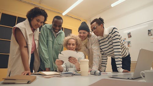 Team of Office Workers Trying to Make a Decision