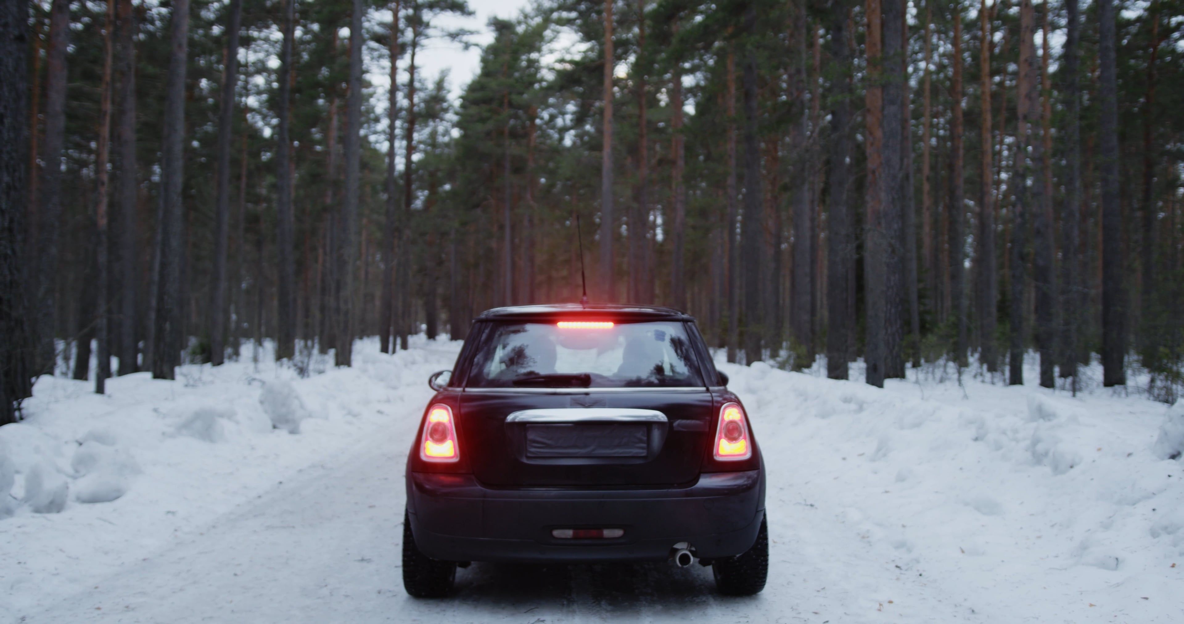 A Car Driving on a Snow Covered Road Free Stock Video Footage, Royalty ...