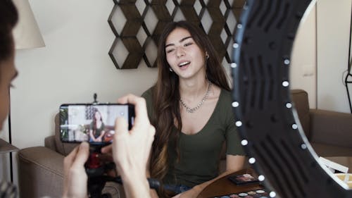 Woman Doing a  Video Stream Using Smartphone