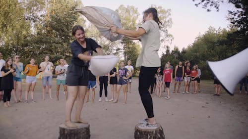 Girls Playing Pillow Fight