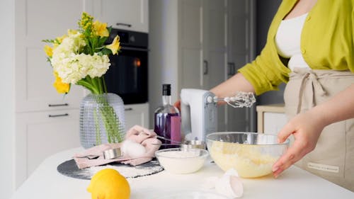 A Baker Mixing the Batter