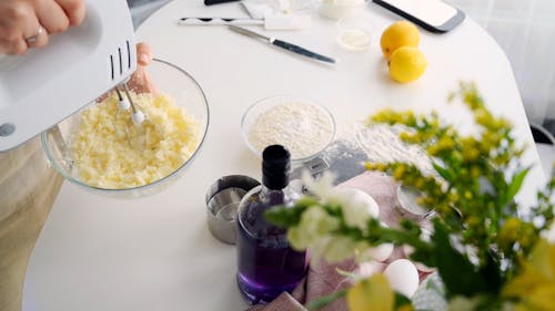 A Person Using a Hand Mixer