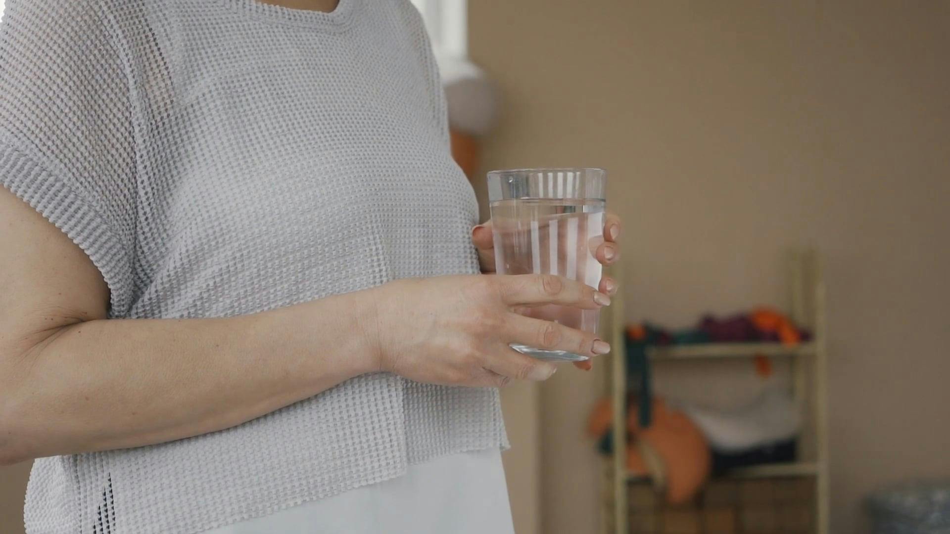Woman Drinking Water from a Drinking Glass · Free Stock Video
