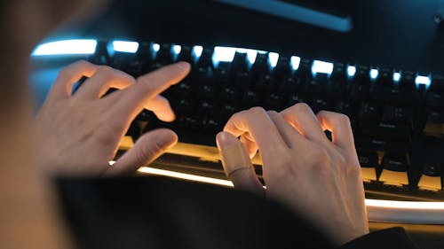 Person Typing using Keyboard