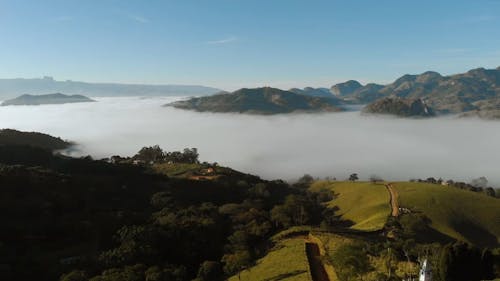 Drone Footage of Mountain View with Foggy Landscape
