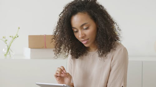 Woman With Tablet in Hands