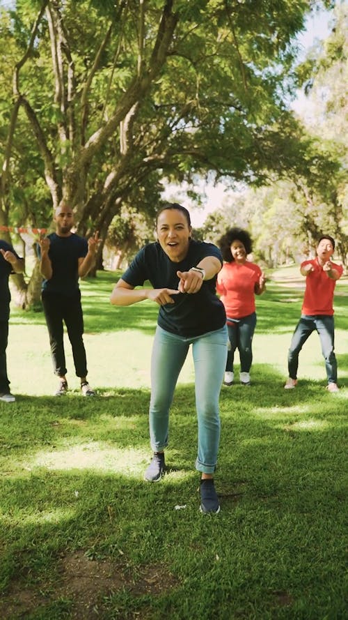 Colleagues Cheering in a Team Building Event