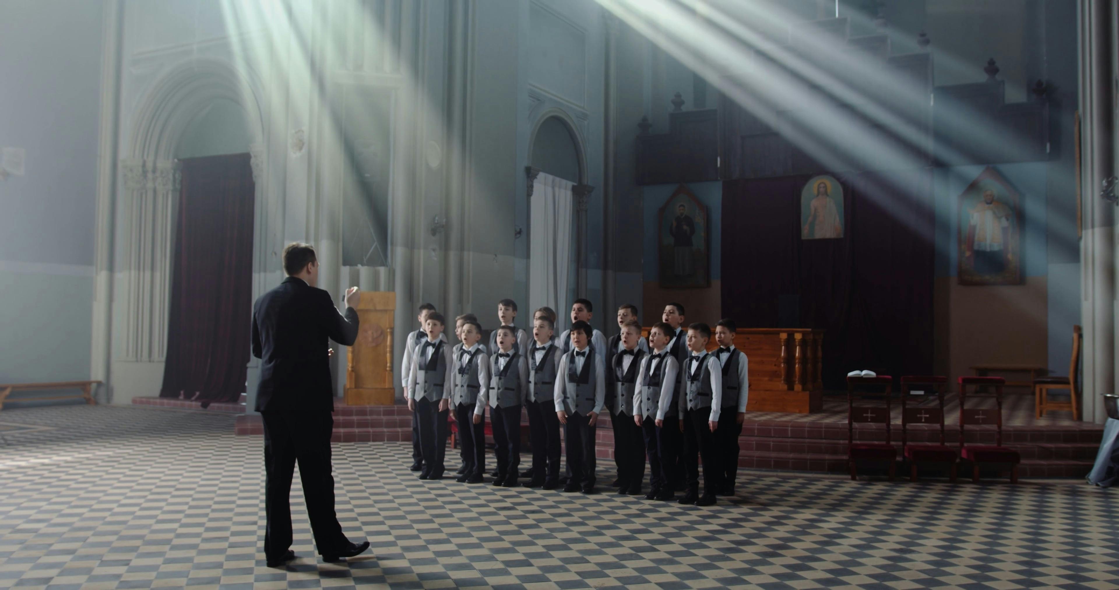 Man Conducting a Choir · Free Stock Video