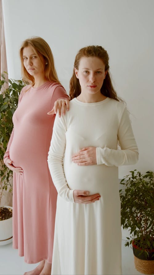 Pregnant Women Wearing Dresses