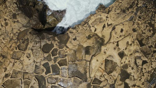 Sea Waves Crashing Through a Rocky Shore