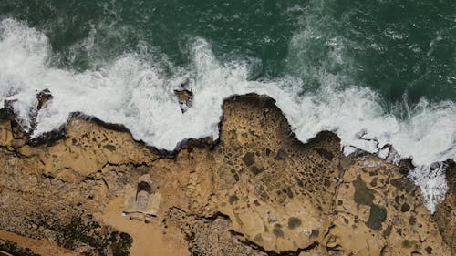 Sea Waves Crashing Through a Rocky Shore