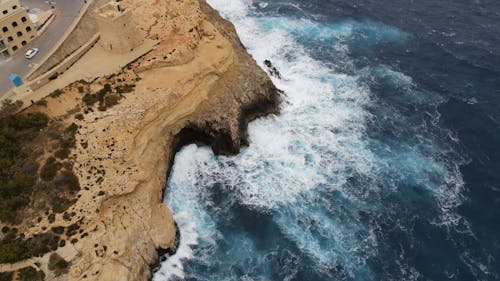 Sea Waves Crashing Through a Rocky Shore