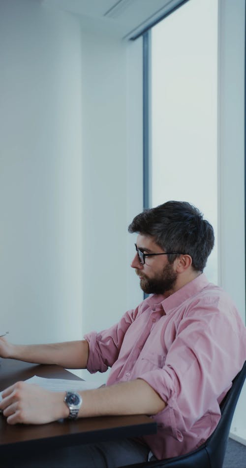 Man Using a Laptop at the Office