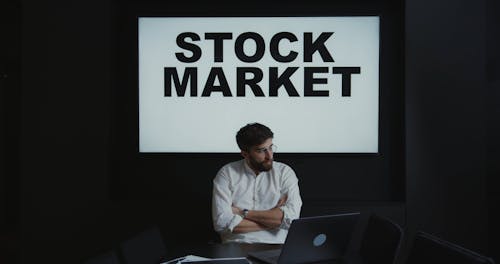 Man Working as a Stock Market