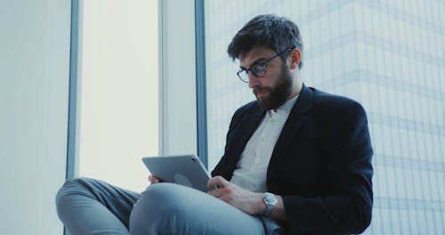 Man Using a Tablet