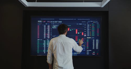 Man Using a Touchscreen Monitor