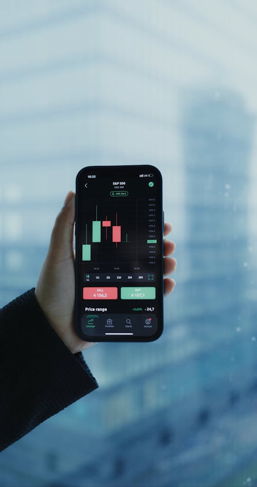 Person Using Stock Market App