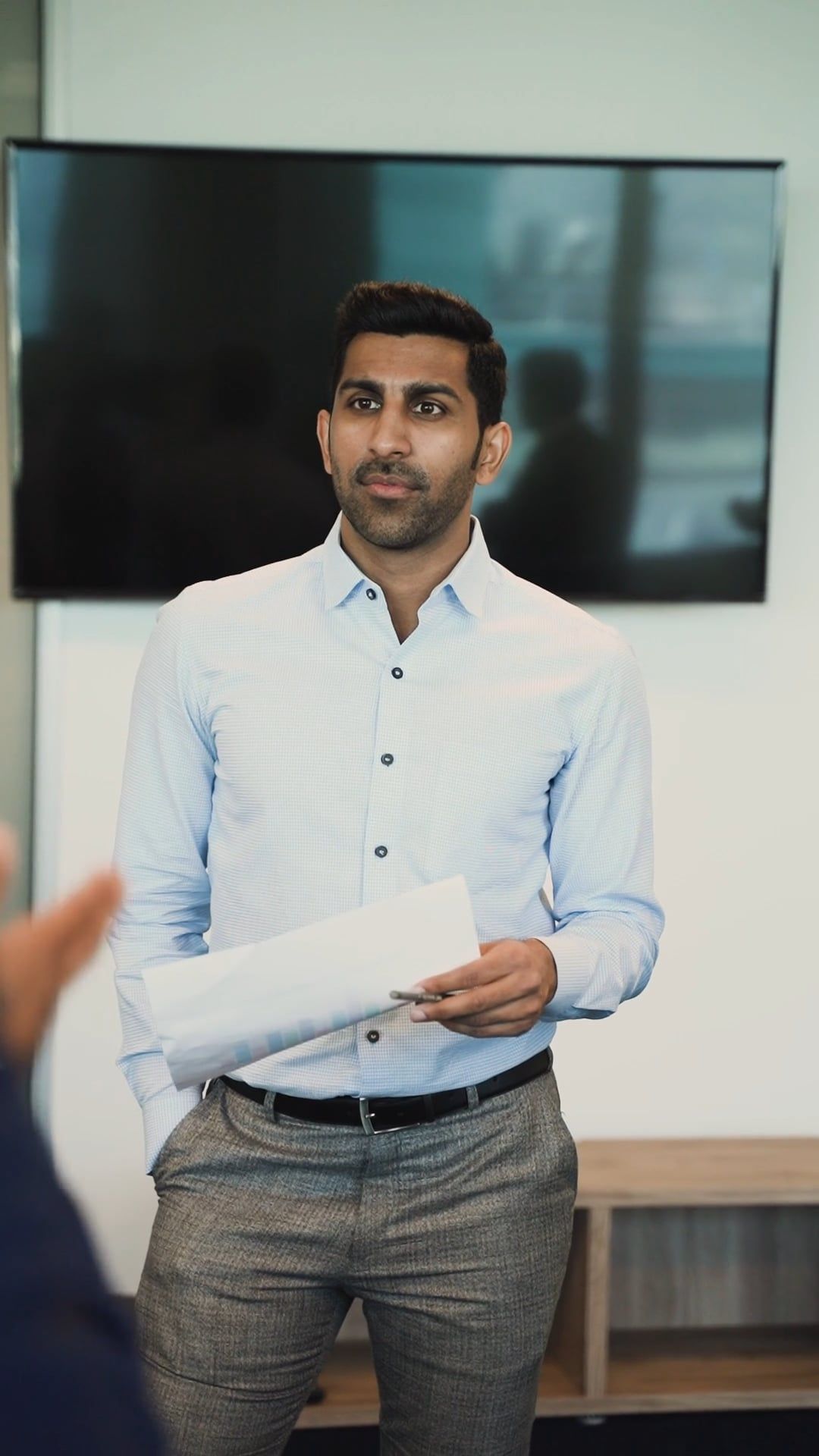 Man Talking while Holding paper · Free Stock Video