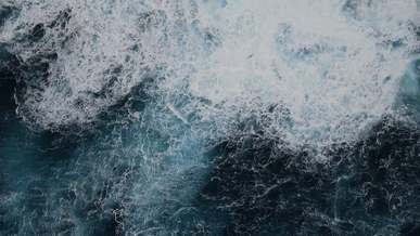 drone footage of waves in the ocean