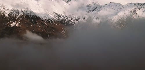 Aerial View of Foggy Mountain Scenery