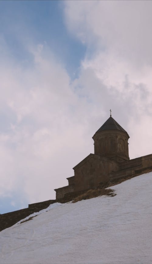 Church on Top of Snow Covered Hill