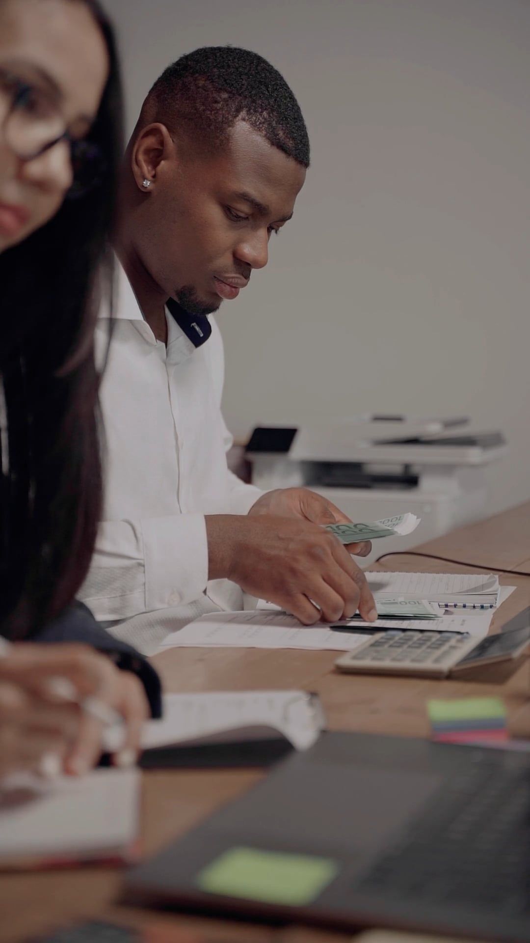 Person Counting Paper A Person Counting Money Using a Calculator Free Stock Video Footage ...