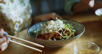 people eating noodles