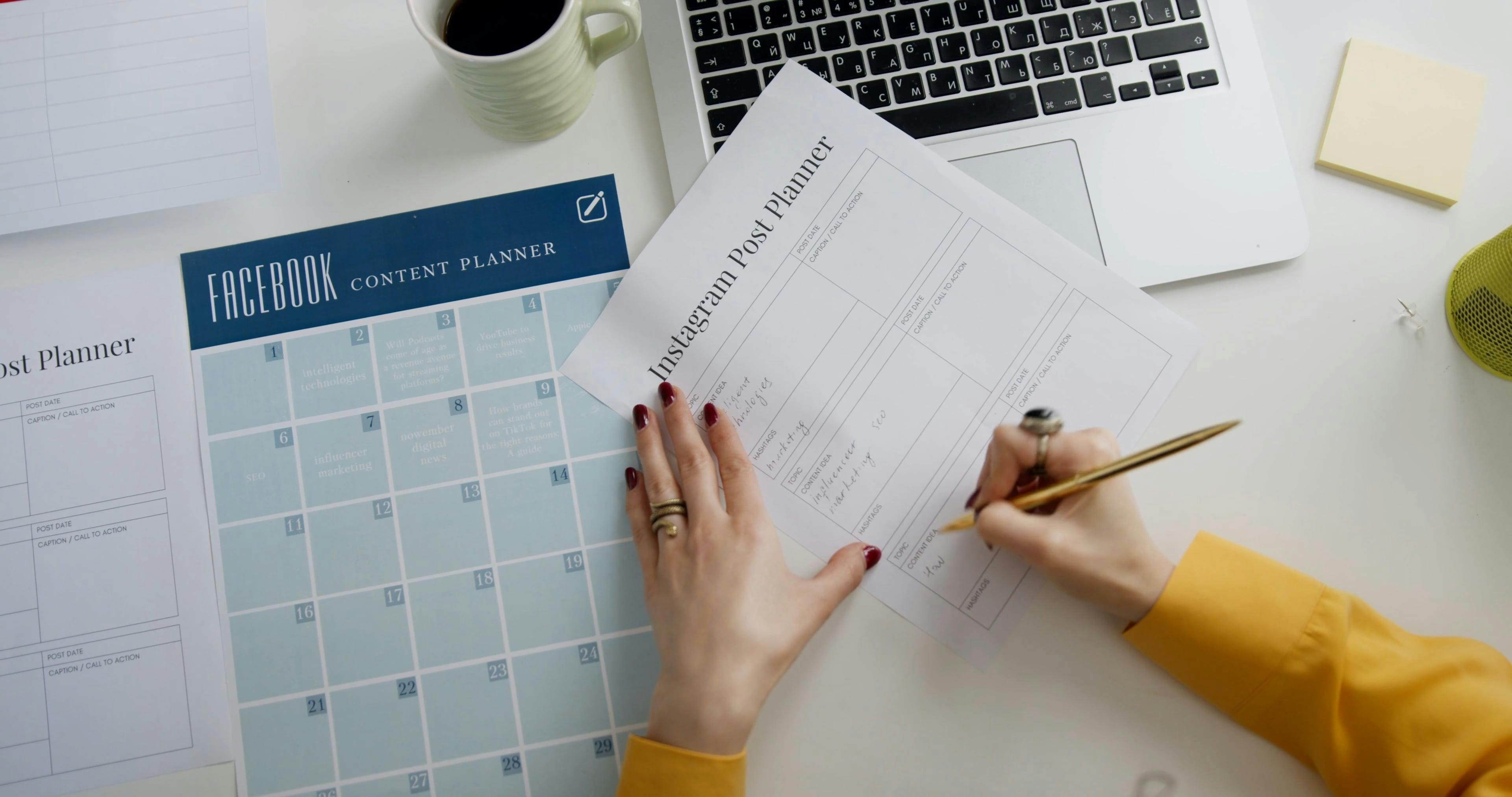 Close-up Shot of a Person Writing on a Planner · Free Stock Video