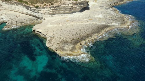 Aerial Footage Of Waves Hitting The Coast