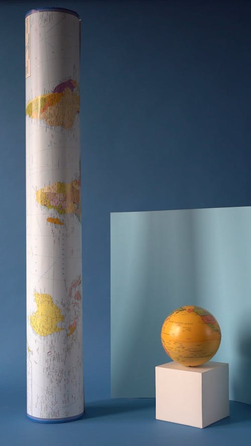 A Globe And A Map On Display