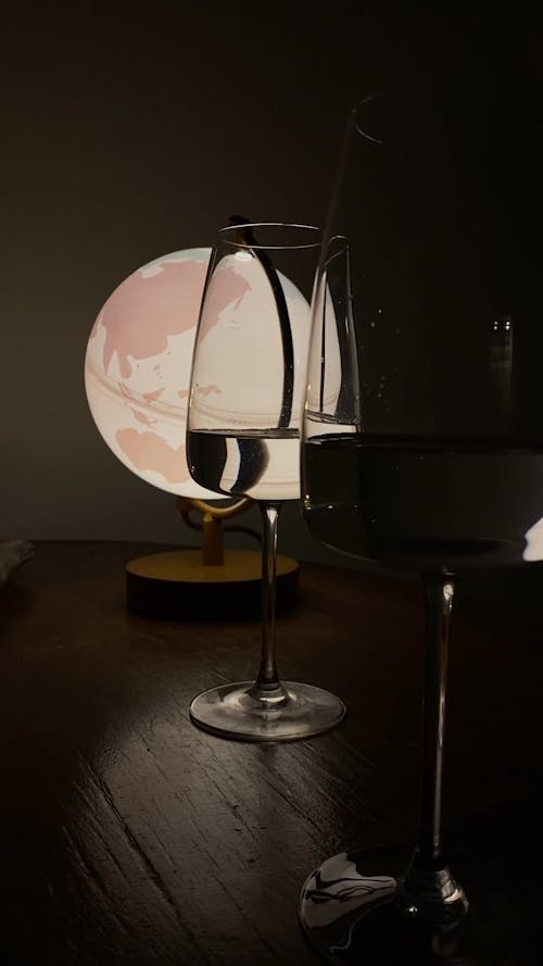 A Lighted Globe Lamp On The Table