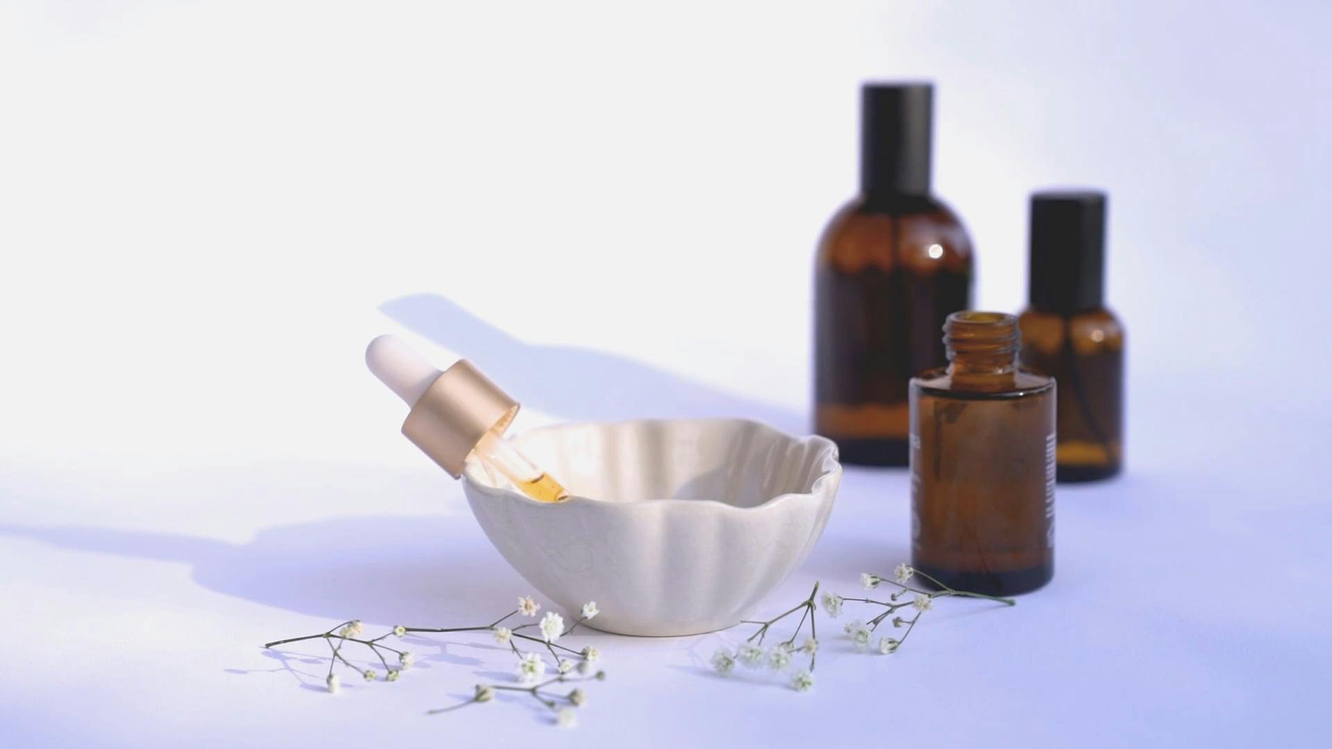 Person Using a Dropper for a Serum · Free Stock Video