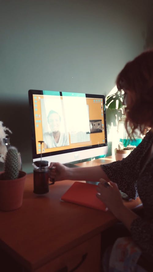 Woman Having a Video Call with a Man