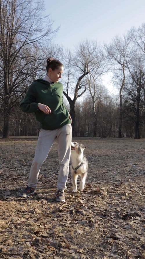 Woman Playing with her Dog 