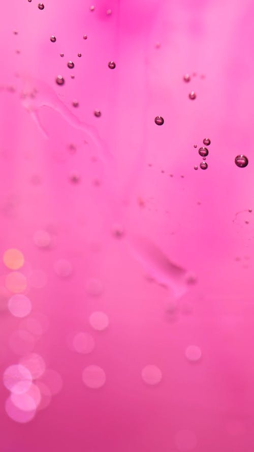Bubbles in a Pink Colored Liquid