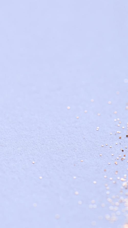 Glitter on a Purple Surface