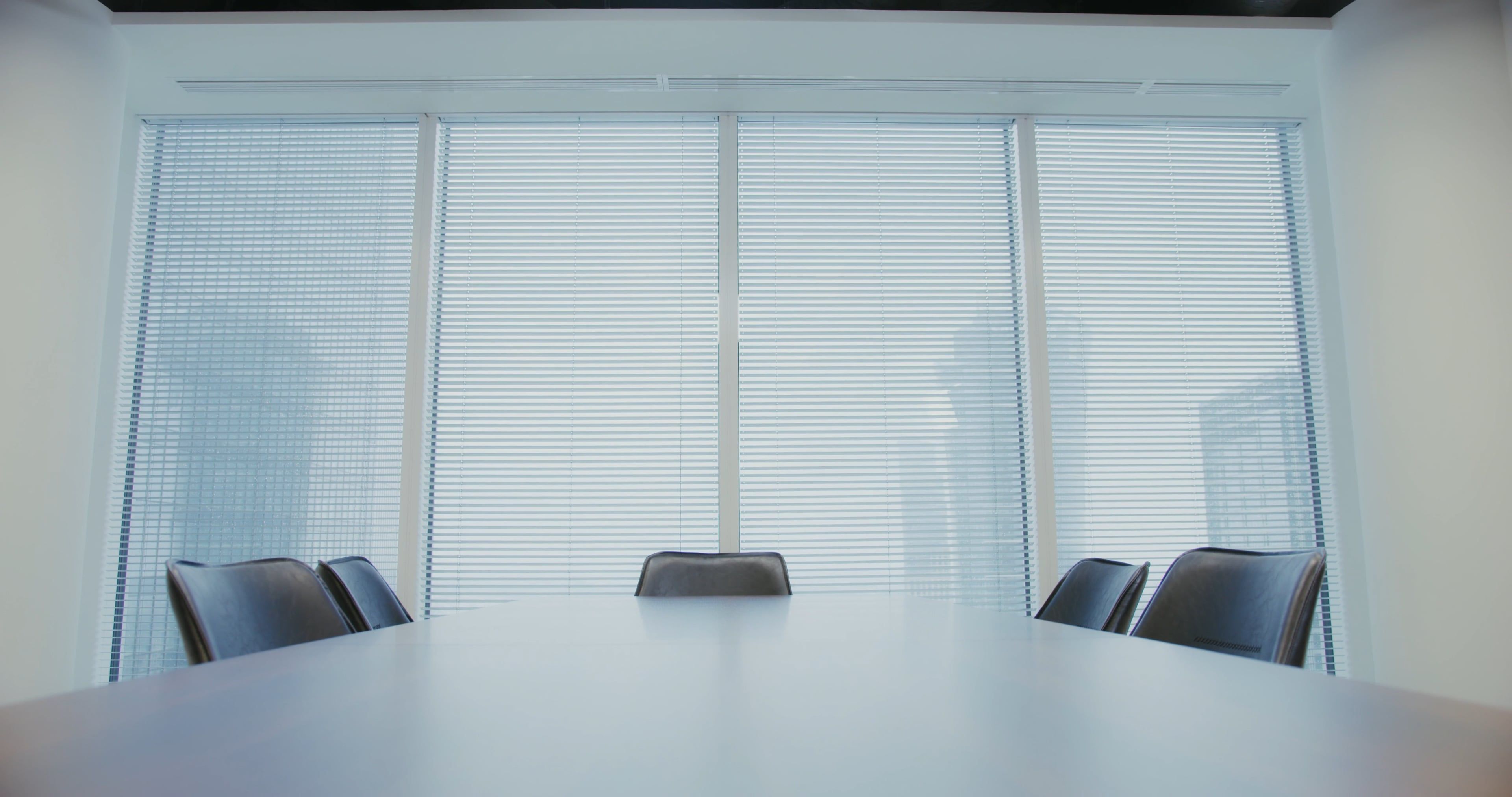 Sunlit conference room where advisors meet clients.