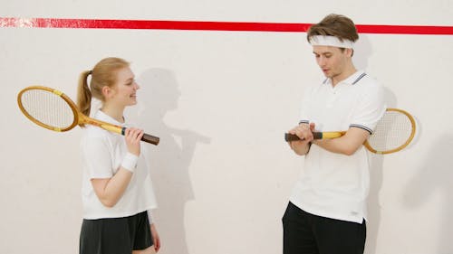 Squash Players Talking on the Court