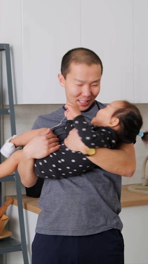 Father Playing with Daughter