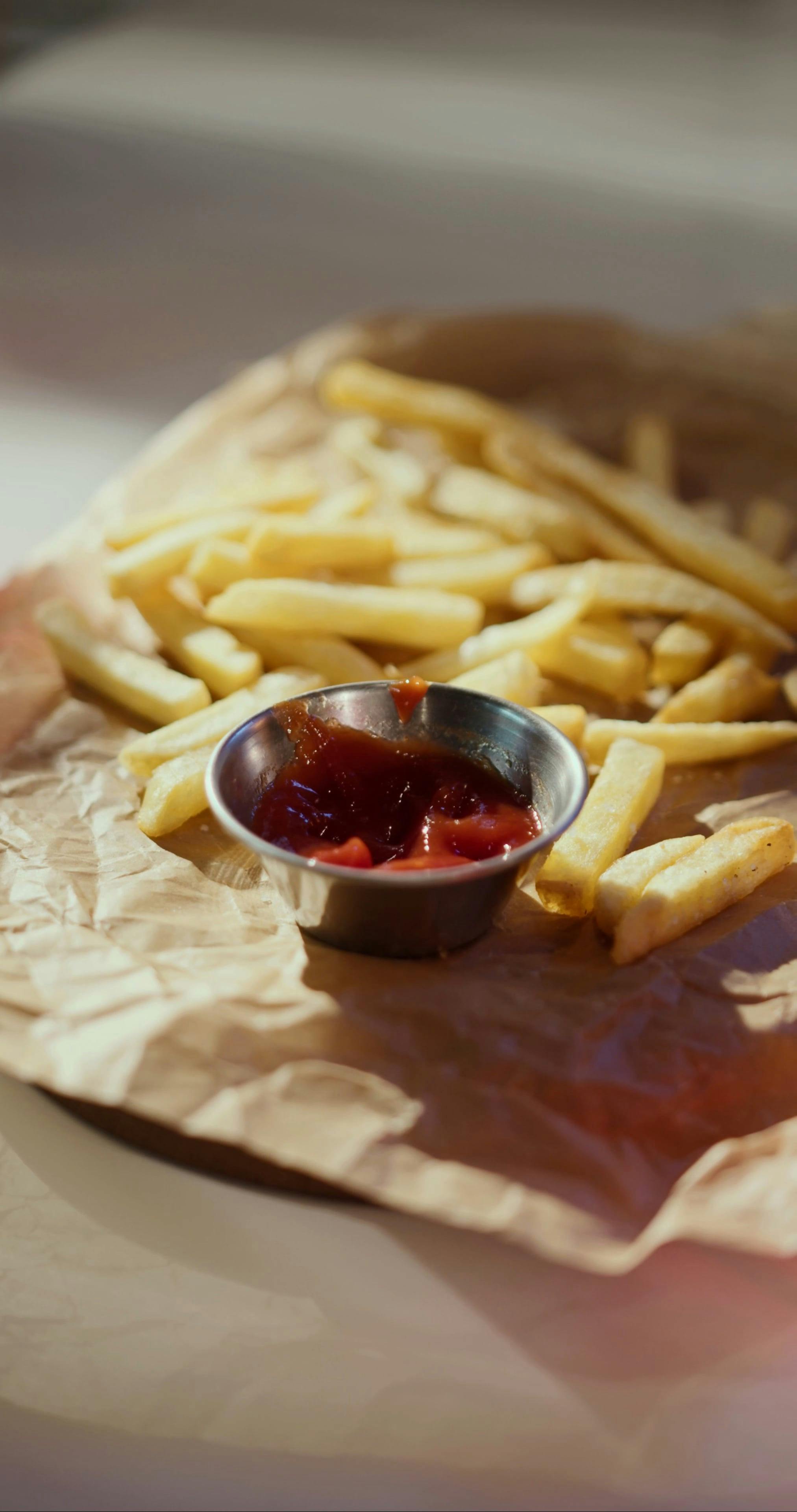 Person Dipping Fries in Ketchup Free Stock Video Footage, RoyaltyFree
