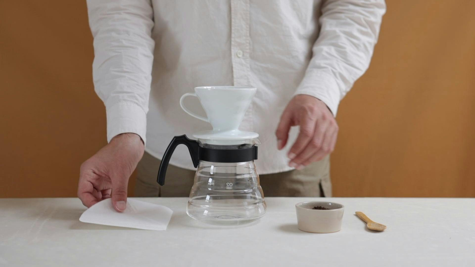 Person Preparing to Make Coffee · Free Stock Video