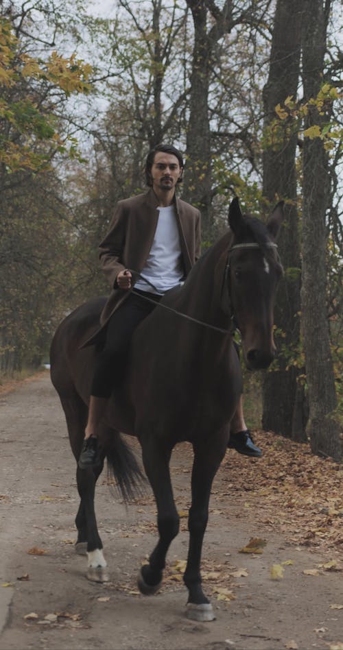 A Man Riding a Horse 