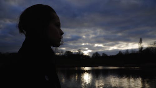 Woman looking at the Lake 