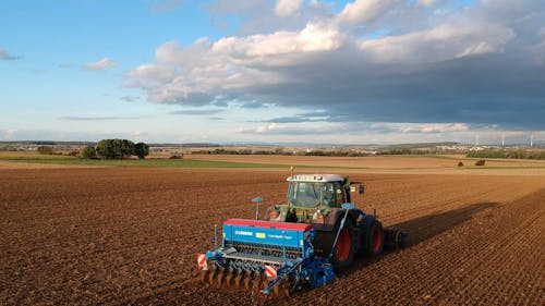 Drone Footage of a Tractor Ploughing a Field 