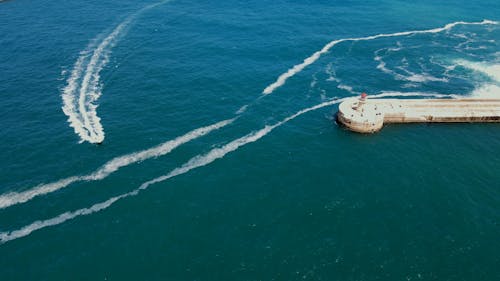 Drone Footage of a Boat Sailing on the Sea