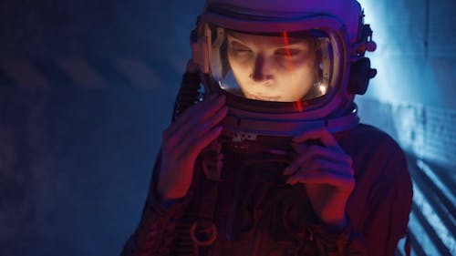 A Woman Wearing A Space Helmet
