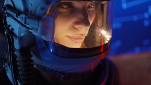 A Woman Wearing A Space Helmet