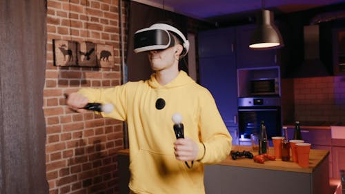 A Man Using Virtual Reality Goggles