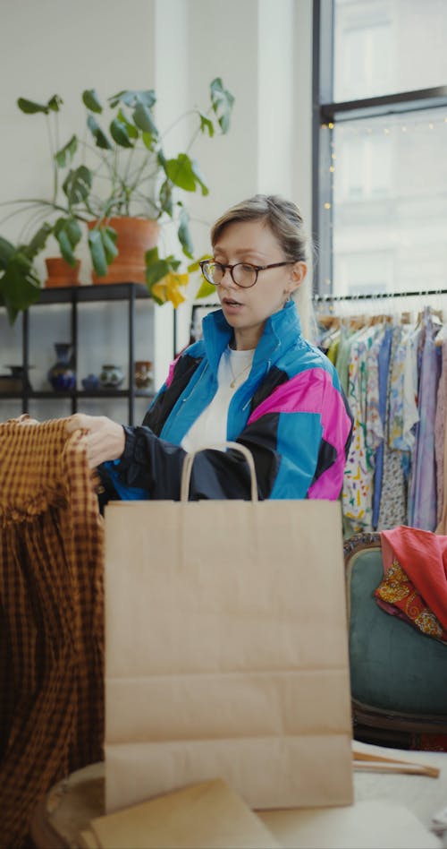 Woman Holding Paper Bag