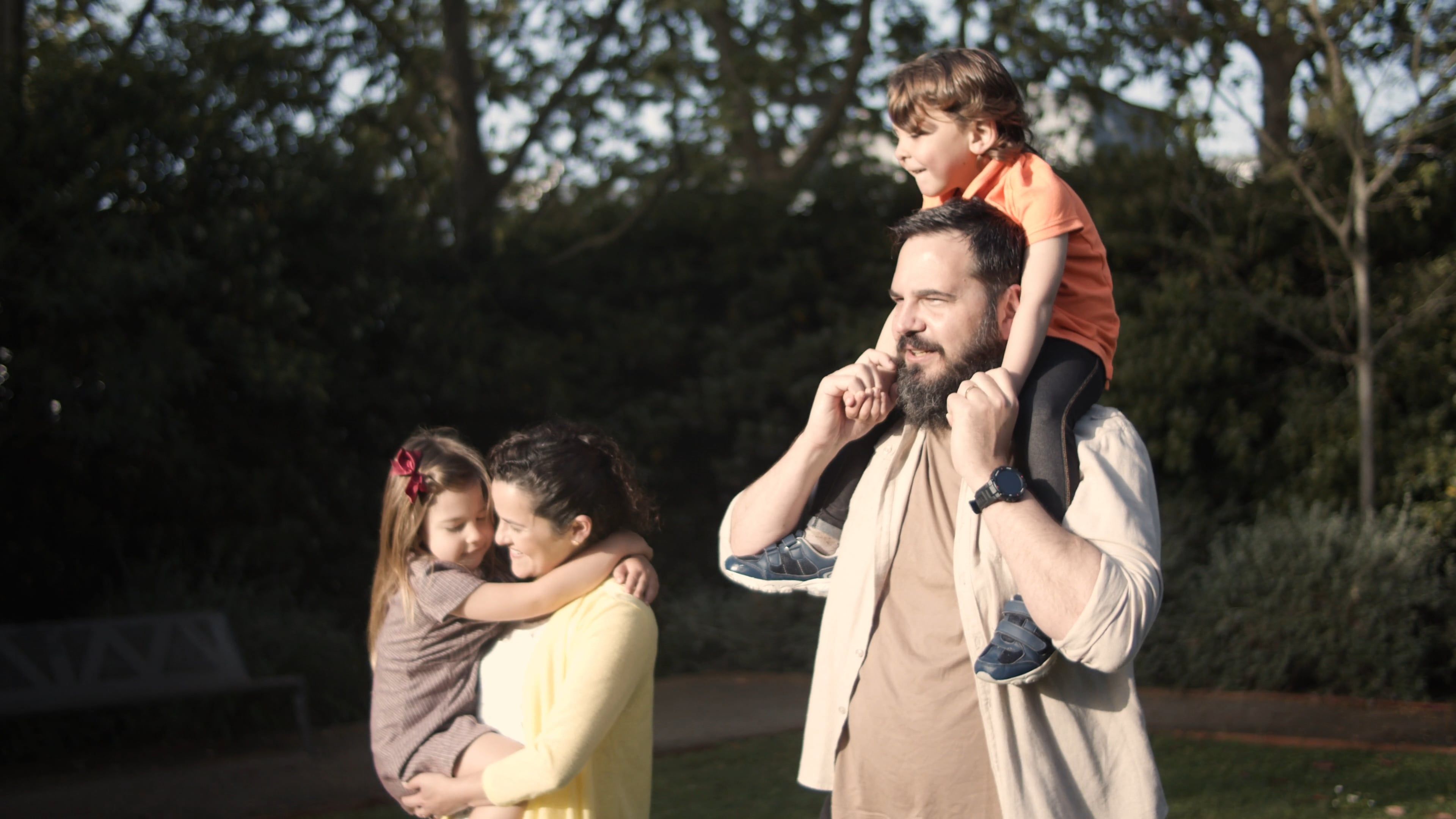 Parents Carrying Their Children · Free Stock Video